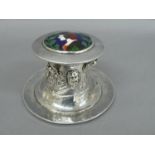 Omar Ramsden & Alwyn C E Carr - A Capstan shaped silver inkwell with enamel decoration of a woman in