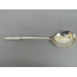 Bernard Cuzner - silver spoon with foliate decoration to top. Birmingham 1943. 30 ozt. Length 25