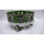 Liberty & Co. Tudric Pewter fruit bowl with green glass liner and pierced foliate decoration on four