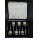 A set of six silver seal top teaspoons, London 1924 maker David L Fullerton - cased