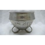 Archibald Knox for Liberty & Co.English Pewter bowl with fruit pattern on three curved open feet,