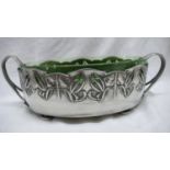 Archibald Knox for Liberty & Co. Tudric Pewter Oval planter with two loop handles, pierced foliate