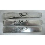 Archibald Knox for Liberty & Co. three Tudric Pewter butter knives with stylized leaf and stem
