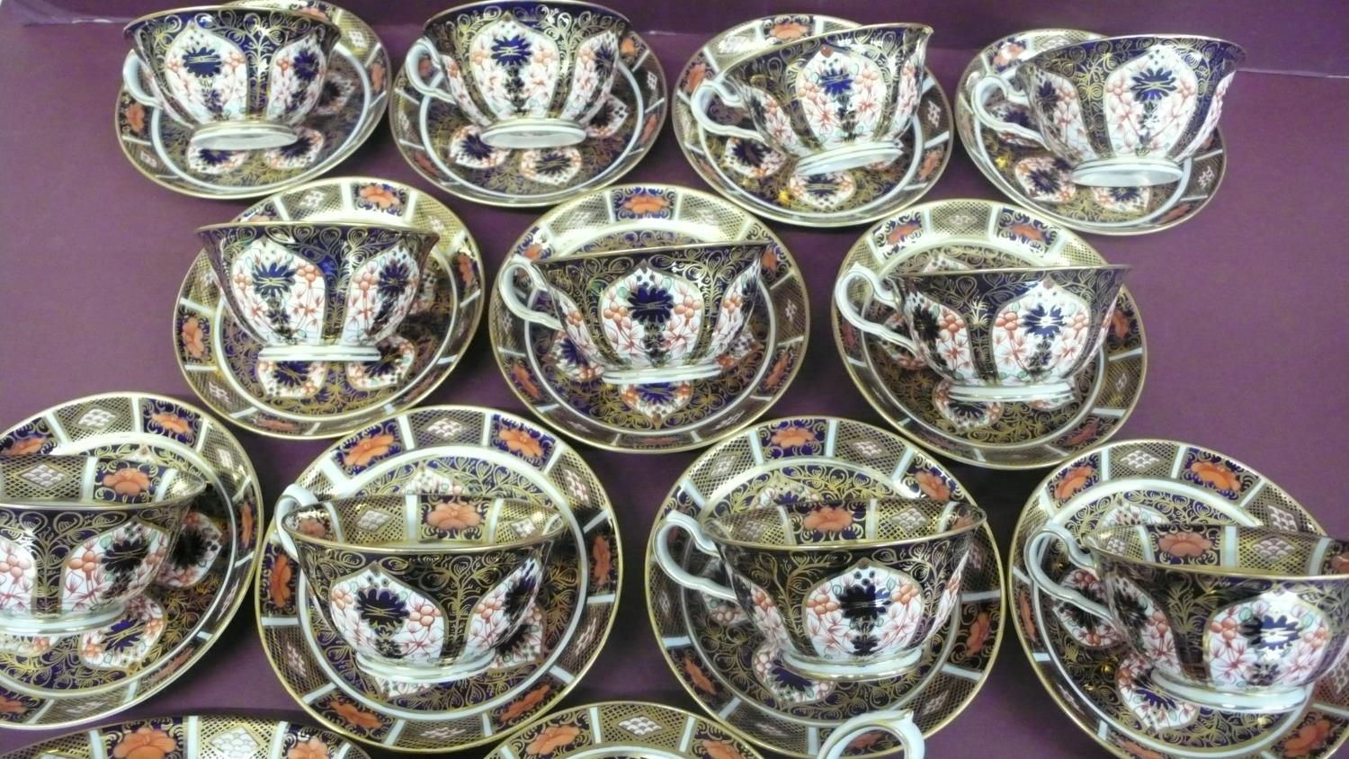 A set of twelve Royal Crown Derby Imari pattern tea cups, saucers, milk jug and sugar basin - - Image 2 of 5