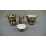 Four Royal Crown Derby Imari pattern pots - tallest 3 ins - 1910, 1914, 1939 & 1957