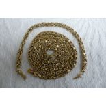 Boodle and Dunthorpe 18 ct. gold complicated knot and link necklace and matching bracelet - necklace