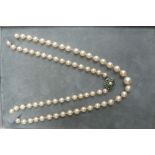 Boodle and Dunthorpe graduated cultured Pearl necklace with an 18 ct. white gold peridot and diamond
