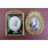 Two oval miniatures of beauties in jewelled brass frames - ht. 5.75 ins