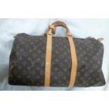 Louis Vuitton Paris 'womans keepall' imitation dark brown leather with LV designs, tan leather