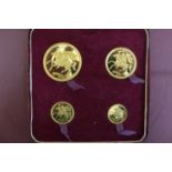 1973 Isle of Man four gold coin set cased with certificate No. 0182 £5, £2, sovereign and half