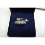 Platinum sapphire and diamond eternity ring together with 18 ct. white gold wedding band - both size