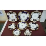 A Coalport dinner service for twelve persons - panel cobalt pattern consisting of 12 dinner plates