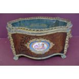 19th/20thC French Kingwood marquetry serpentine sided ormolu mounted jardiniere with oval Sevres