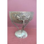 Art Nouveau hammered metal tazza on curved legs with leaf decoration to top and bottom on raised