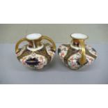 Pair of Royal Crown Derby Imari pattern two handled Urns 1914 - Ht. 3 ins