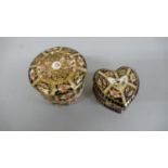 Two Royal Crown Derby boxes with covers in the Imari pattern. Heart shaped 1939, Drum 1917 - tallest