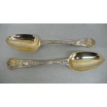 WIV pair of ornate silver gilt serving spoons - London 1833 - 7 ozt. - Maker William Chawner