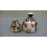 Two Royal Crown Derby vases in the Imari pattern - tallest 4 ins - 1909 & 1924