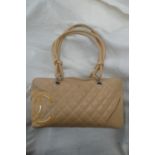 Chanel quilted peach leather handbag with patent leather logo, knot and loop handles, chrome