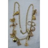 18ct gold chain having fourteen 9ct gold charms - 50 grammes total