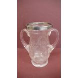 Late Victorian etched clear glass two handled vase with silver rim and decoration of flora and fauna