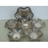 A set of six pierced silver bon bon dishes with serpentine sides - Sheffield 1970's - 22 ozt - Maker