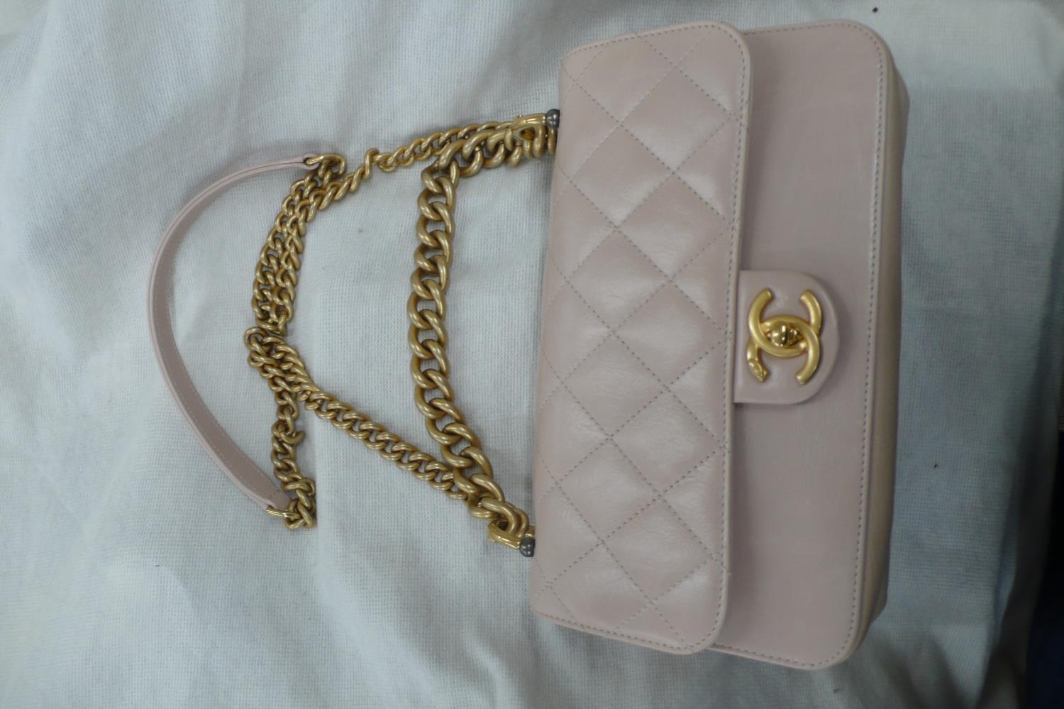 Chanel straight line flap bag, quilted pale pink leather with gold plated long and short handles,