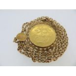 Gold coin pendant necklace 1974 Isle of Man £5 set in 9 ct. gold frame with 9 ct. gold chain