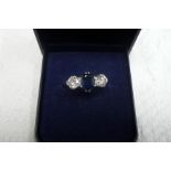 Platinum sapphire and diamond three stone ring - size M/N