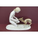 Lorenz Hutschenreuther, porcelain nude girl kneeling feeding a fawn, signed C Werner, length 12.5ins