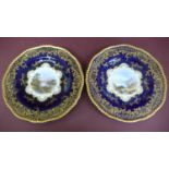 Pair of Coalport cabinet plates with gilt borders and scenes of 1) Ashness bridge & 2) Loch