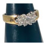 An 18ct yellow gold dress ring, set with round brilliant cut diamonds, estimated total weight 0.