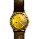 A 1970s gents 9ct gold cased Omega Automatic wristwatch, the gilt dial with applied gold batons