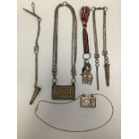 A collection of 20th century Omani silver jewellery and charms, comprising a silver Omani Bedouin ‘