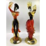 A pair of handmade Murano glass figures of Flamenco dancers, each bearing a worn label for