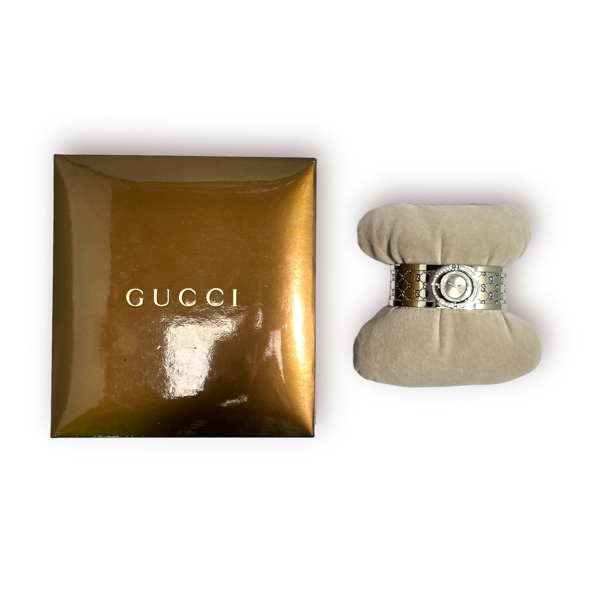 A modern ladies Gucci series 112 ‘Twirl’ bangle wristwatch, with branded silvered dial, diamond
