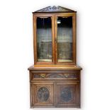 A Victorian walnut Secretaire Bookcase, with glazed doors enclosing adjustable shelves, secretaire
