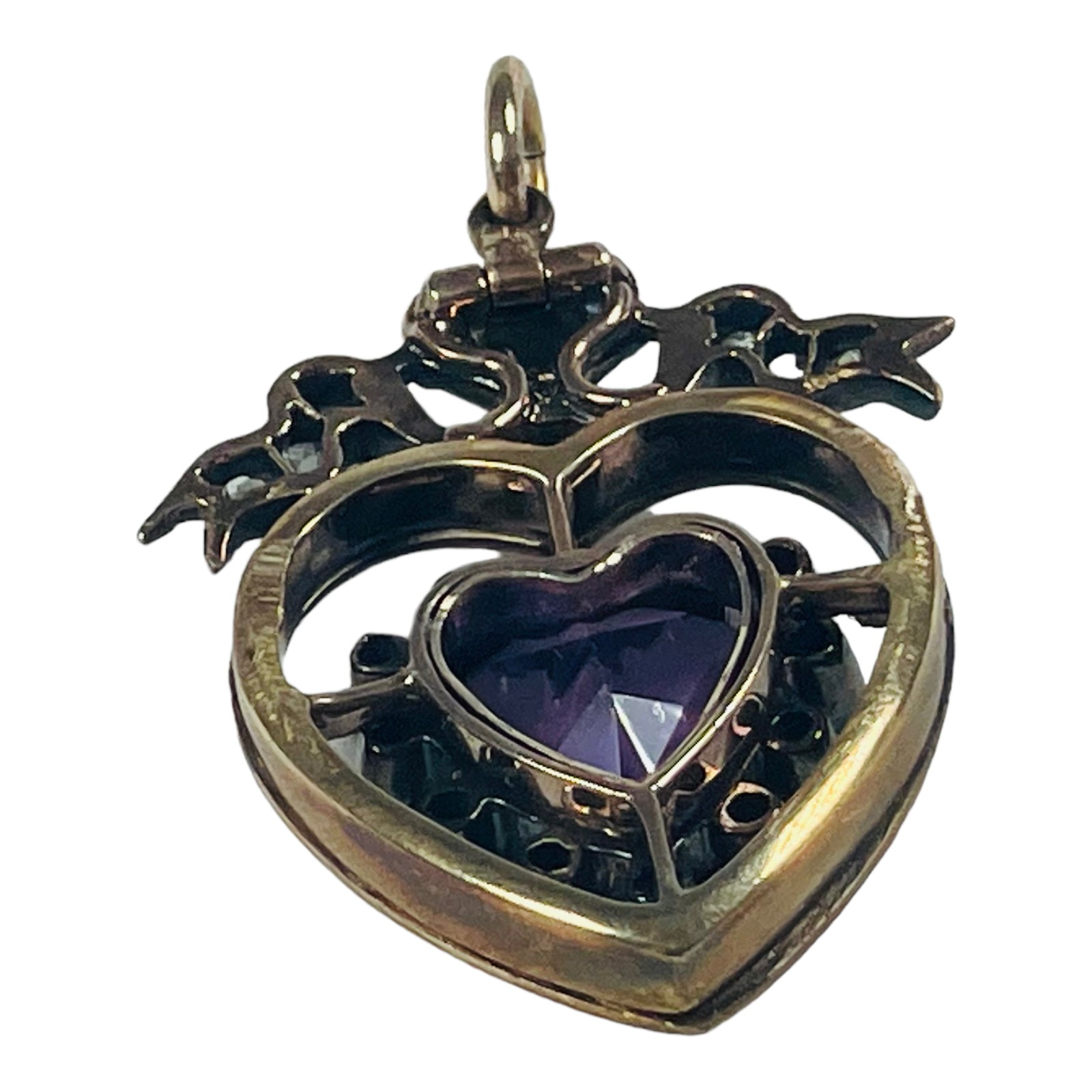 WITHDRAWN - A yellow metal heart shaped pendant, set with an amethyst pendant to the centre, in a - Image 2 of 3