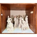 Thirteen various Italian ‘A. Belcari’ composite figures of women in ballgowns, five on wooden