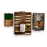 A Jaques travel chess set in fitted and branded case, together with a Jaguar branded backgammon