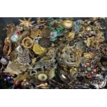 A large collection of assorted costume jewellery brooches including examples by Hollywood, La