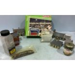 A Subbuteo stand set No. 61216 together with a quantity of railway buildings and gravel etc.