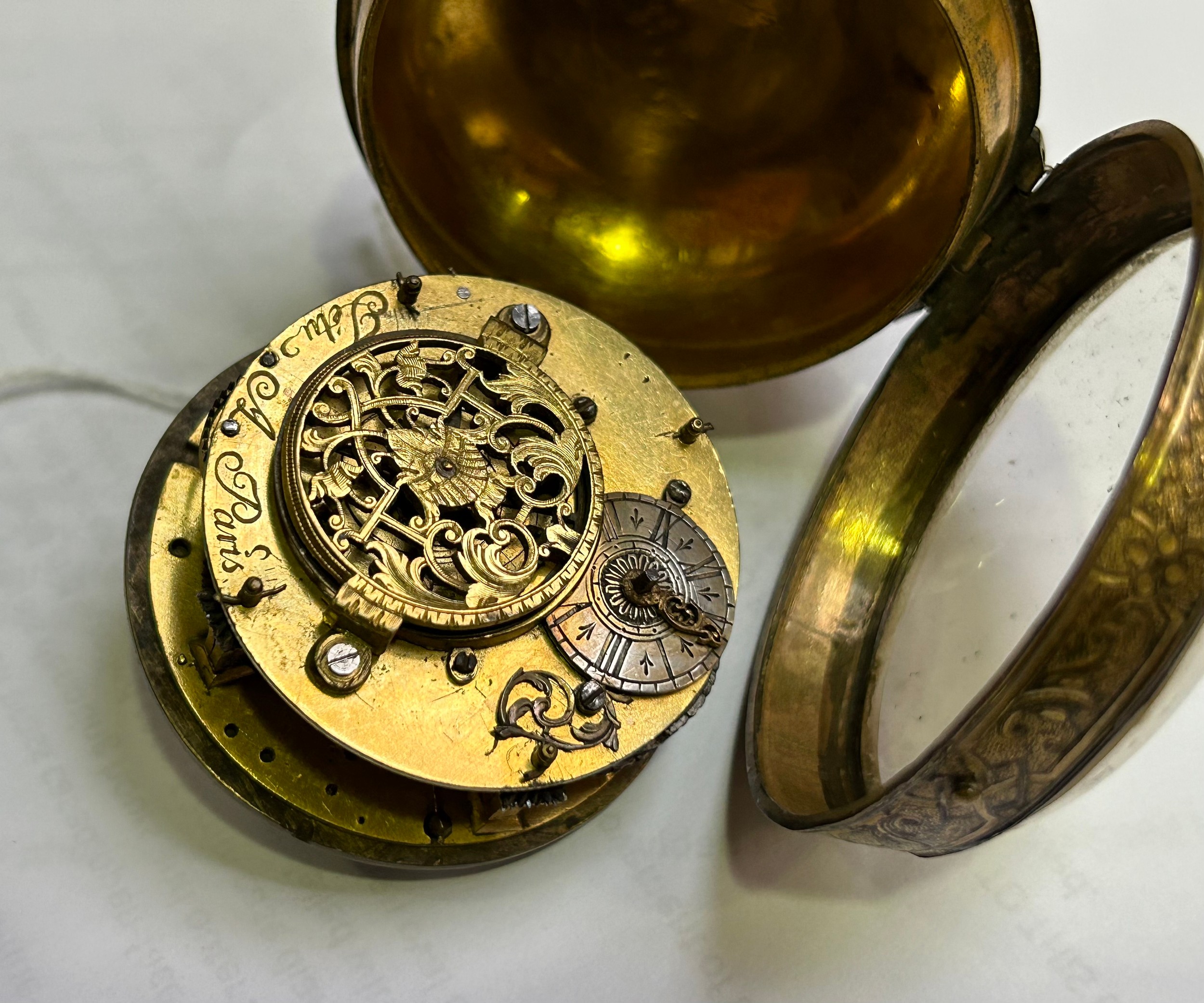 A large 18th/19th century French brass cased open-face verge pocket watch, the worked brass dial - Image 5 of 7