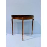 An inlaid Edwardian mahogany demi-lune folding games table, satinwood crossbanding with ebony and