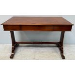 A Victorian mahogany side / hall table raised on shaped trestle supports to a central turned