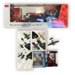 A Rastar R/C Mercedes-Benz ACTROS and Mercedes-AMG GT, sealed in original box, together with,