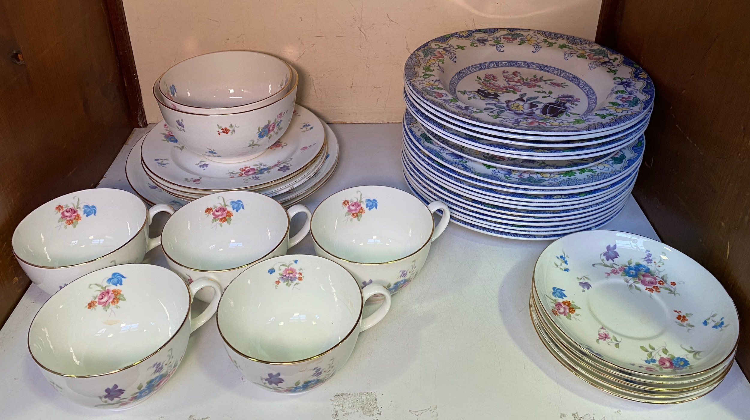 A Spode Copeland floral pattern part tea and dinner set, manufactured for Harrods Ltd, London,