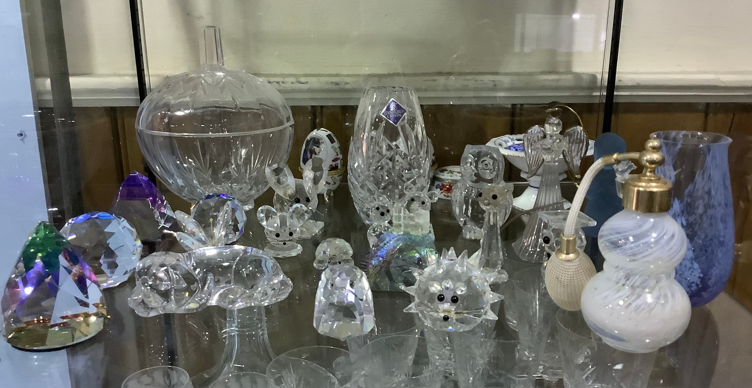 Eight various Swarovski crystal animal figures, including a hedgehog, cat (af), turtle, butterfly,