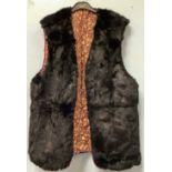 A three-quarter length light brown mink fur coat, probably from Hong Kong, a lady’s three-quarter