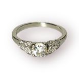 A platinum ring, set with a round brilliant cut diamond to the centre, estimated weight 0.53 carats,